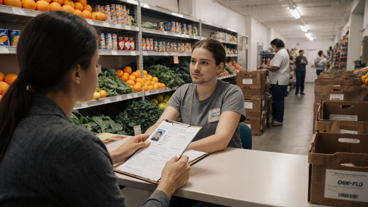 Volunteer at a desk reviewing ID and bills while shelves hold fresh produce and canned goods.